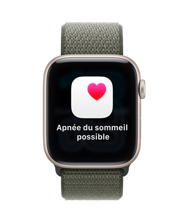 Apple Watch SE 3, boîtier en aluminium, lumière stellaire, notification apnée du sommeil possible, cœur rose sur carré blanc, côté droit, Digital Crown, Boucle Sport, forêt