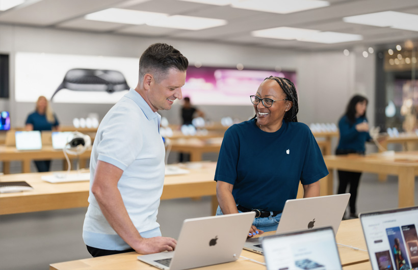 CEO Marc-André Lebeau receives tech support from Kareema, a Business Team member, at a local Apple Store.