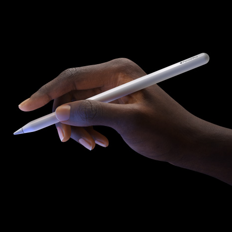 Apple Pencil Pro, side exterior, sleek design with touch sensor near tip, purple colour reflecting from iPad Pro display, hand holding from the side with extended index finger showcasing double tap feature