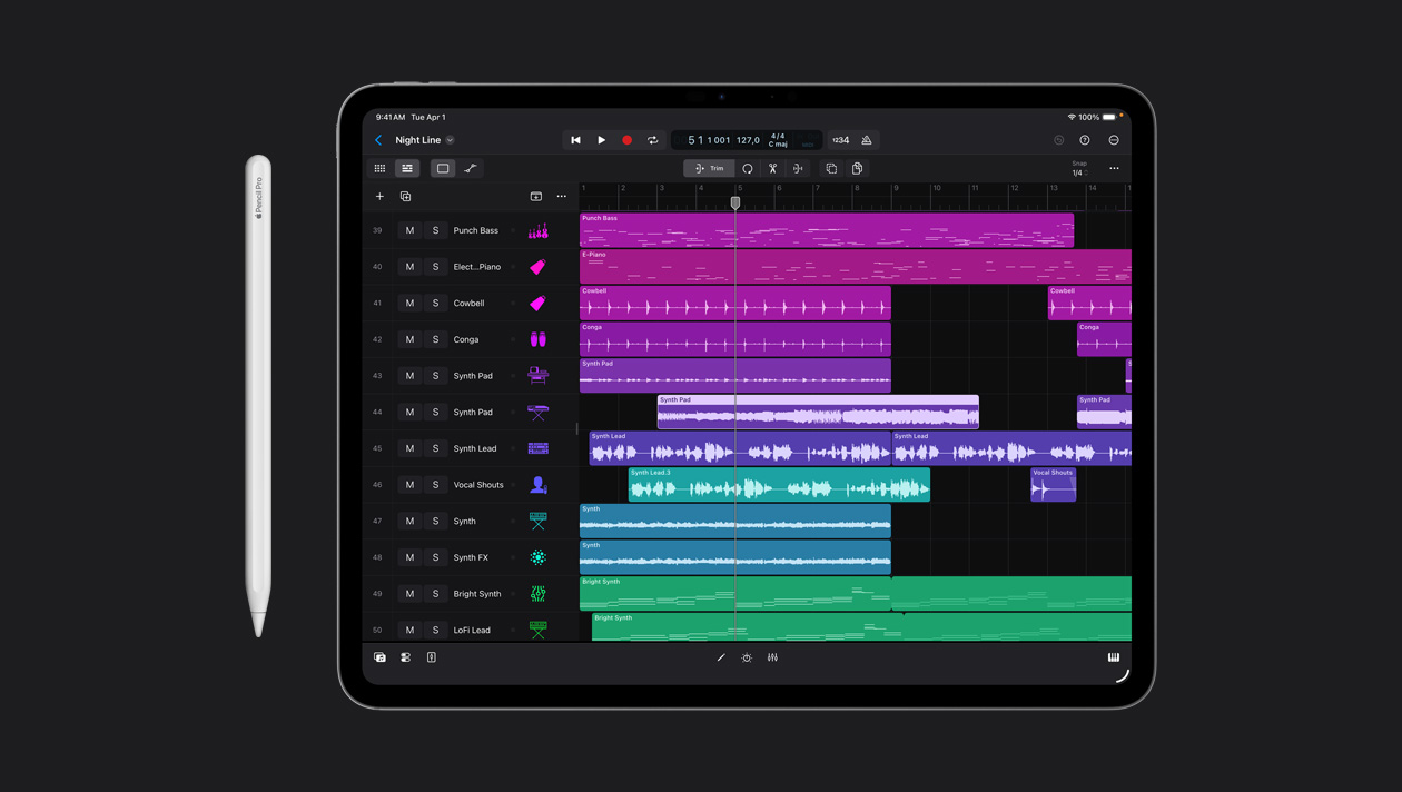 iPad Pro 13 screen showing Logic Pro workspace, list of different instruments on the left panel and their soundwaves in different colours on the right, Apple Pencil to the left of device